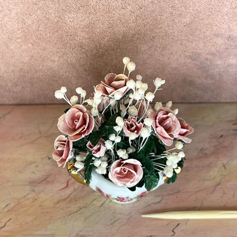 Miniature rosen opsats i rosa farver